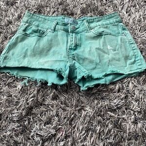 Distressed green denim shorts Puzzle size 3.